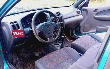 Mazda 323, 1998 год, 170 000 рублей, 11 фотография