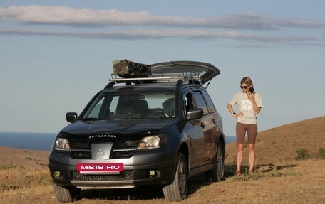 Mitsubishi Outlander III рестайлинг 3, 2003 год, 700 000 рублей, 11 фотография