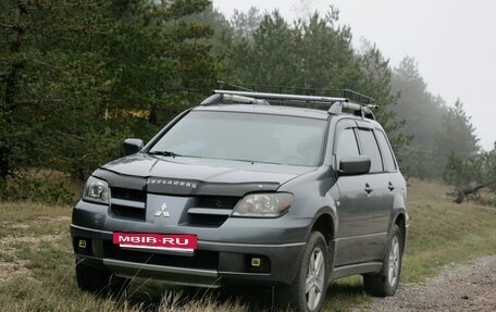 Mitsubishi Outlander III рестайлинг 3, 2003 год, 700 000 рублей, 8 фотография