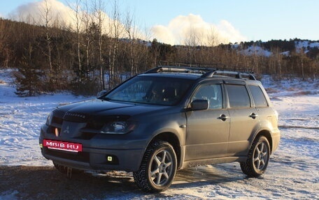 Mitsubishi Outlander III рестайлинг 3, 2003 год, 700 000 рублей, 10 фотография
