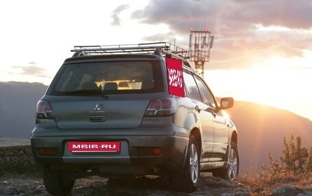 Mitsubishi Outlander III рестайлинг 3, 2003 год, 700 000 рублей, 3 фотография