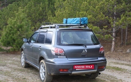 Mitsubishi Outlander III рестайлинг 3, 2003 год, 700 000 рублей, 14 фотография
