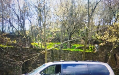 KIA Carnival III, 2005 год, 730 000 рублей, 4 фотография