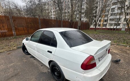 Mitsubishi Lancer VII, 1998 год, 135 000 рублей, 3 фотография