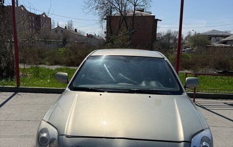 Toyota Avensis III рестайлинг, 2004 год, 740 000 рублей, 2 фотография