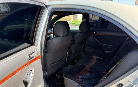 Toyota Avensis III рестайлинг, 2004 год, 740 000 рублей, 9 фотография