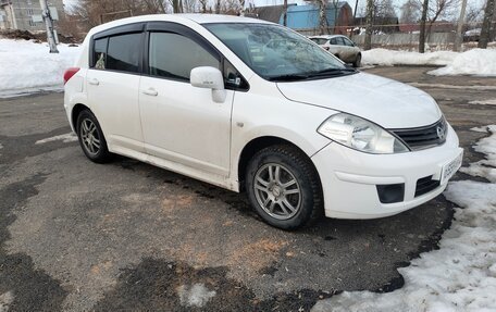 Nissan Tiida, 2011 год, 690 000 рублей, 9 фотография