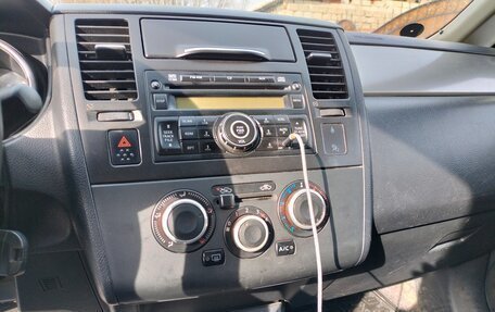 Nissan Tiida, 2011 год, 690 000 рублей, 19 фотография