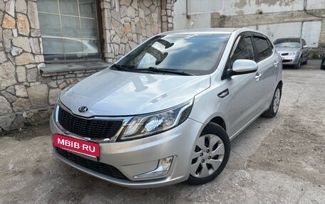 KIA Rio III рестайлинг, 2013 год, 695 000 рублей, 2 фотография