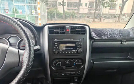 Suzuki Jimny, 2015 год, 1 330 035 рублей, 14 фотография