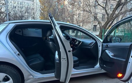 KIA K5 I рестайлинг, 2010 год, 850 000 рублей, 13 фотография
