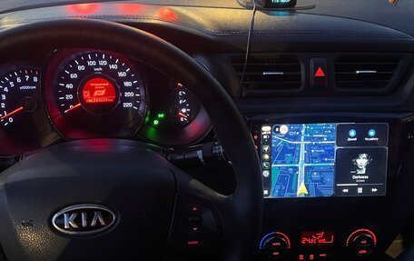 KIA Rio III рестайлинг, 2012 год, 650 000 рублей, 21 фотография