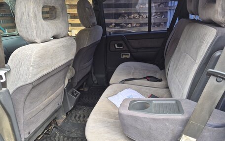 Mitsubishi Pajero III рестайлинг, 1997 год, 650 000 рублей, 24 фотография