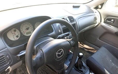 Mazda 323, 2002 год, 179 000 рублей, 13 фотография