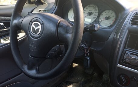 Mazda 323, 2002 год, 179 000 рублей, 7 фотография