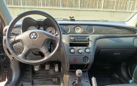 Mitsubishi Outlander III рестайлинг 3, 2006 год, 600 000 рублей, 12 фотография