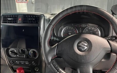 Suzuki Jimny, 2011 год, 750 000 рублей, 12 фотография