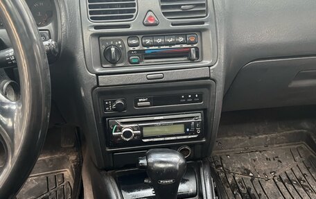 Subaru Outback IV рестайлинг, 1997 год, 260 000 рублей, 11 фотография