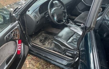 Subaru Outback IV рестайлинг, 1997 год, 260 000 рублей, 9 фотография