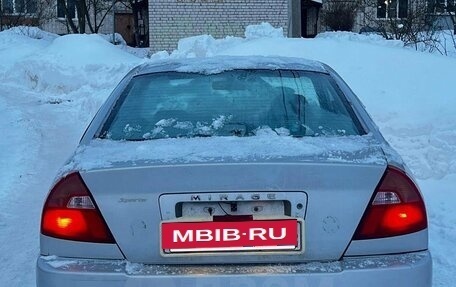 Mitsubishi Mirage VI рестайлинг, 2001 год, 90 000 рублей, 4 фотография