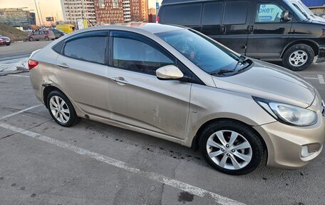Hyundai Solaris II рестайлинг, 2011 год, 670 000 рублей, 3 фотография