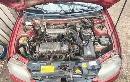 Mazda 323, 1996 год, 170 000 рублей, 2 фотография