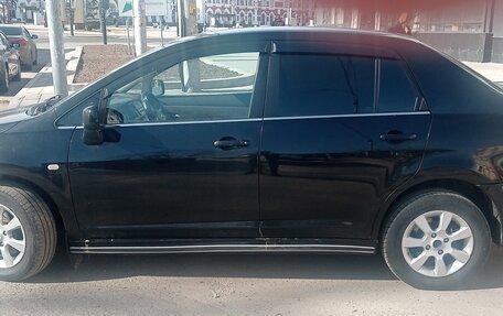 Nissan Tiida, 2010 год, 605 000 рублей, 11 фотография