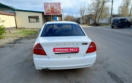 Mitsubishi Mirage VI рестайлинг, 2000 год, 250 000 рублей, 3 фотография