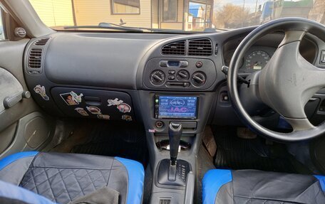 Mitsubishi Mirage VI рестайлинг, 2000 год, 250 000 рублей, 6 фотография