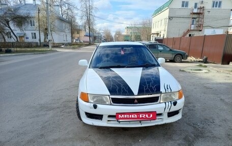 Mitsubishi Mirage VI рестайлинг, 2000 год, 250 000 рублей, 10 фотография
