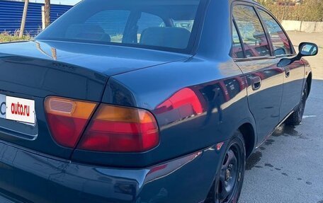 Mitsubishi Carisma I, 1996 год, 210 000 рублей, 12 фотография