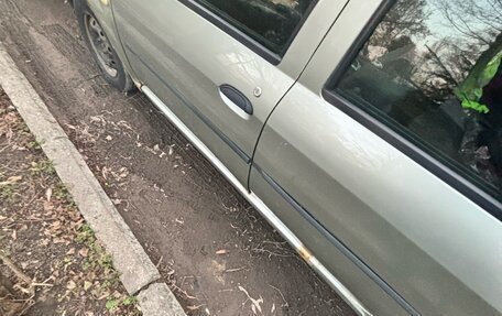 Renault Logan I, 2011 год, 385 000 рублей, 4 фотография