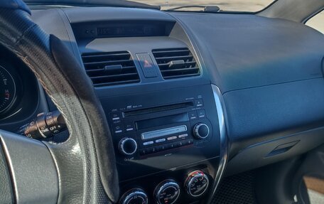 Suzuki SX4 II рестайлинг, 2009 год, 800 000 рублей, 8 фотография