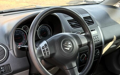 Suzuki SX4 II рестайлинг, 2010 год, 999 000 рублей, 13 фотография