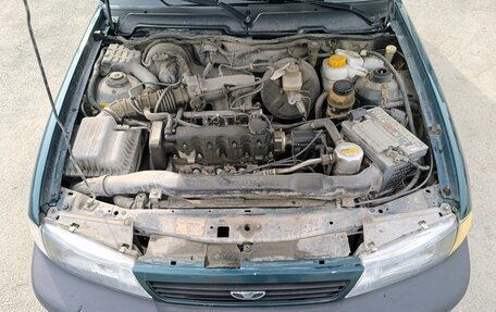 Daewoo Nexia I рестайлинг, 1997 год, 140 000 рублей, 34 фотография