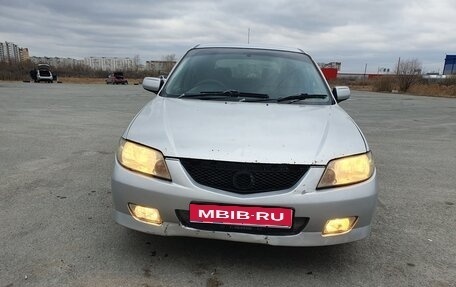 Mazda Familia Y11, 2001 год, 130 000 рублей, 1 фотография