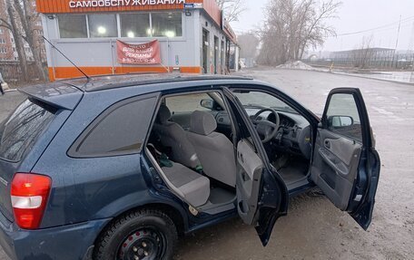 Mazda Familia Y10, 1999 год, 340 000 рублей, 3 фотография