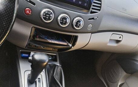 Mitsubishi L200 IV рестайлинг, 2012 год, 1 600 000 рублей, 4 фотография