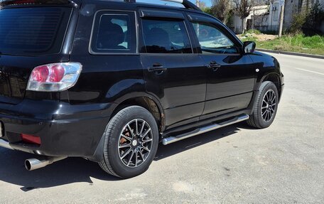 Mitsubishi Outlander III рестайлинг 3, 2003 год, 800 000 рублей, 10 фотография