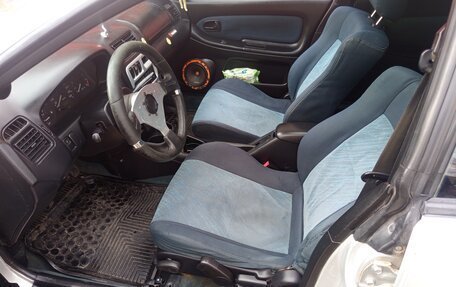 Mazda 323, 1997 год, 210 000 рублей, 10 фотография