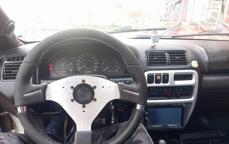 Mazda 323, 1997 год, 210 000 рублей, 12 фотография