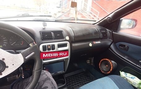 Mazda 323, 1997 год, 210 000 рублей, 13 фотография