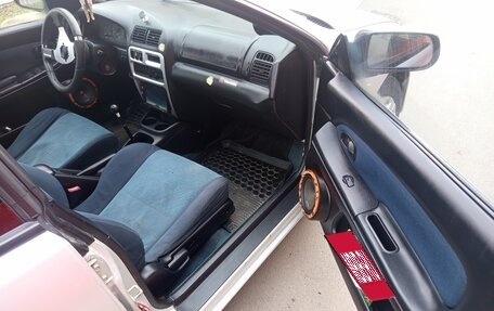 Mazda 323, 1997 год, 210 000 рублей, 17 фотография