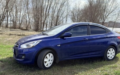 Hyundai Solaris II рестайлинг, 2011 год, 650 000 рублей, 3 фотография