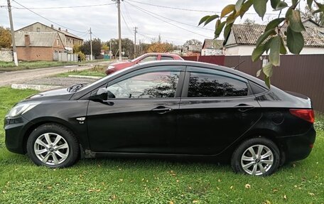 Hyundai Solaris II рестайлинг, 2013 год, 800 000 рублей, 4 фотография