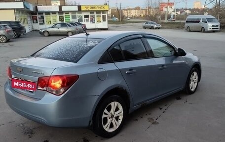 Chevrolet Cruze II, 2009 год, 650 000 рублей, 3 фотография
