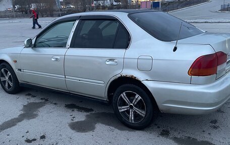 Isuzu Gemini IV, 1997 год, 130 000 рублей, 5 фотография