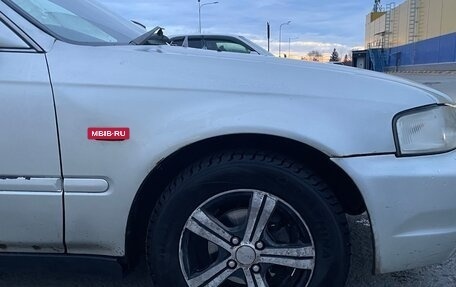 Isuzu Gemini IV, 1997 год, 130 000 рублей, 6 фотография