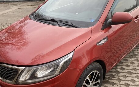 KIA Rio III рестайлинг, 2012 год, 750 000 рублей, 2 фотография
