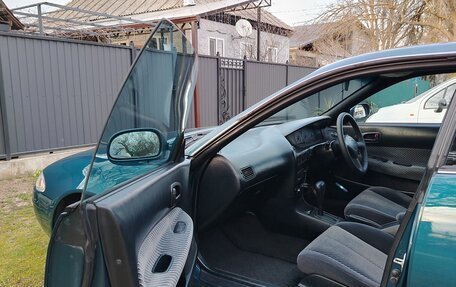 Toyota Sprinter Marino, 1993 год, 645 000 рублей, 31 фотография